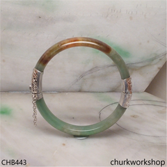 Green with red splotches hinges jade bangle