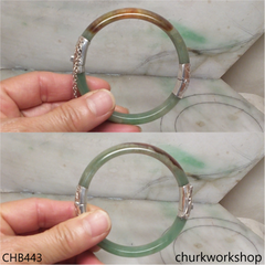 Green with red splotches hinges jade bangle