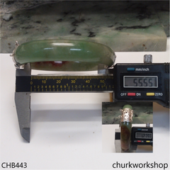 Green with red splotches hinges jade bangle