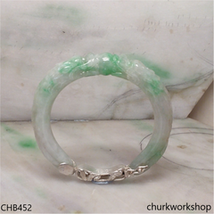 Carved double dragon jade bangle