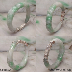 Carved double dragon jade bangle