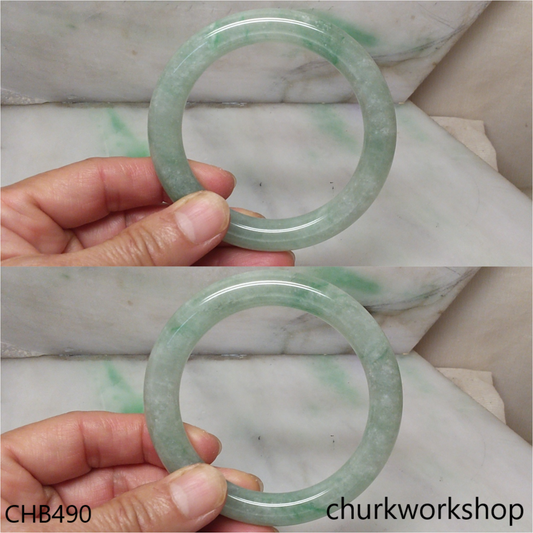 Large light green with splotches green jade bangle