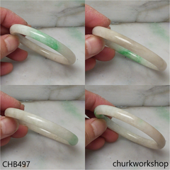 White base with splotches green jade bangle