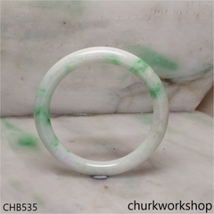 White base with splotches green jade bangle