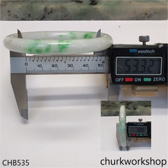 White base with splotches green jade bangle