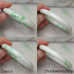 White base with splotches green jade bangle