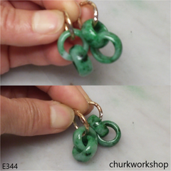 Green interlocking jade dangling earrings