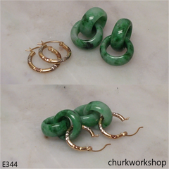 Green interlocking jade dangling earrings