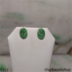 Carved green jade ear studs