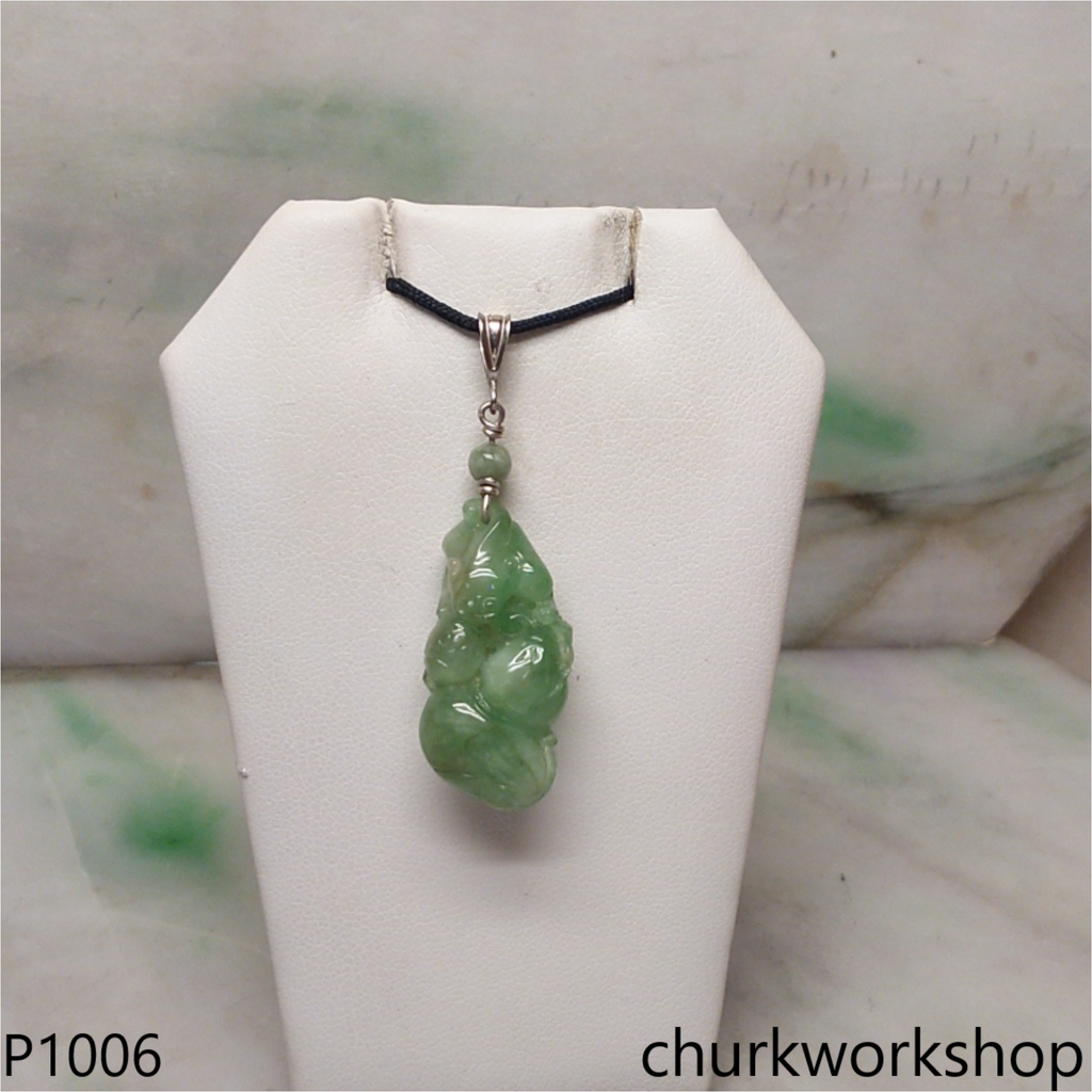 Light green jade cavred pendant