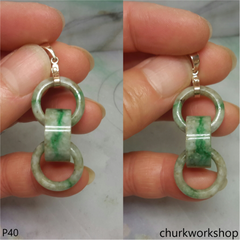 Triple ring pale green jade pendant