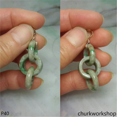 Triple ring pale green jade pendant