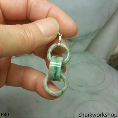 Triple ring pale green jade pendant