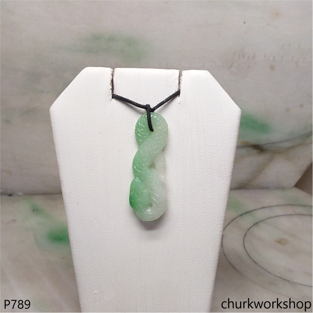 Jade snake pendant.