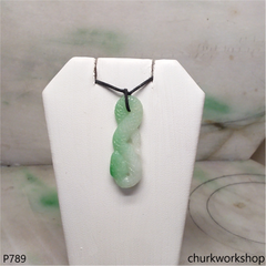 Jade snake pendant.