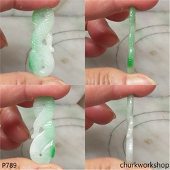Jade snake pendant.