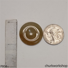 Light brownish round jade pendant
