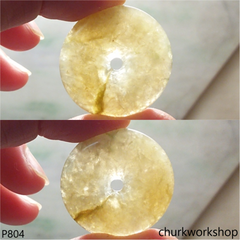 Light brownish round jade pendant