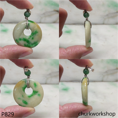 White base with splotches green jade Donut pendant