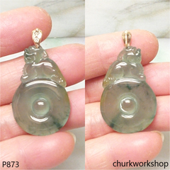 Bluish green jade pendant in 14k gold
