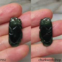 Dark green jade fish pendant