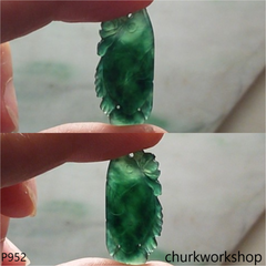 Dark green jade fish pendant