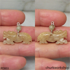 Light yellowish jade dragon pendant