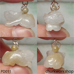 Pale yellow jade OX pendant