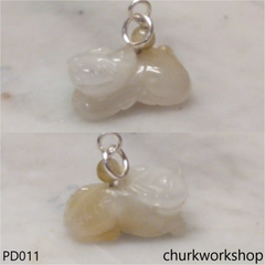 Pale yellow jade OX pendant