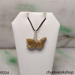 Brownish jade dragon pendant