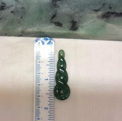 Dark green jade pendant