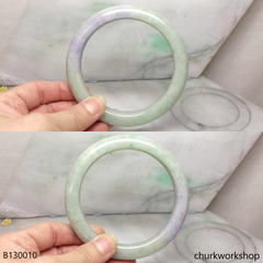 Upper arm light green with splotches lavender jade bangle