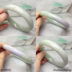 Upper arm light green with splotches lavender jade bangle