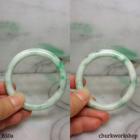 White base with green splotches jade bangle