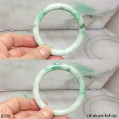 White base with green splotches jade bangle