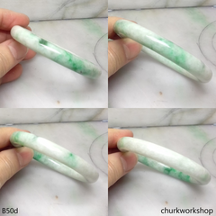White base with green splotches jade bangle