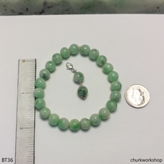 Light green beads jade bracelet with charm