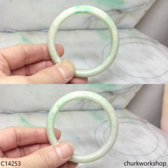 Small white base with green jade bangle