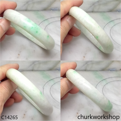 White base with splotches green jade bangle