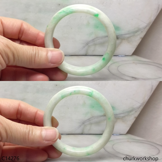 White base with splotches apple green jade bangle