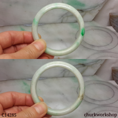 White base with splotches apple green jade bangle