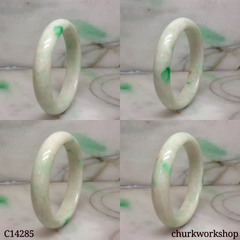 White base with splotches apple green jade bangle