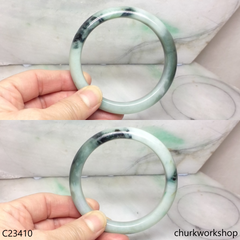 Large light green with splotches dark and bluish green jade bangle