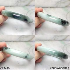 Large light green with splotches dark and bluish green jade bangle