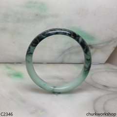 Light green with splotches dark green jade bangle