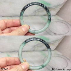 Light green with splotches dark green jade bangle