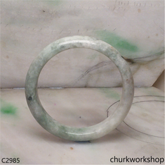 Light green with splotches dark green jade bangle