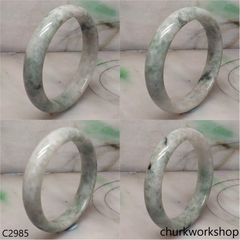 Light green with splotches dark green jade bangle