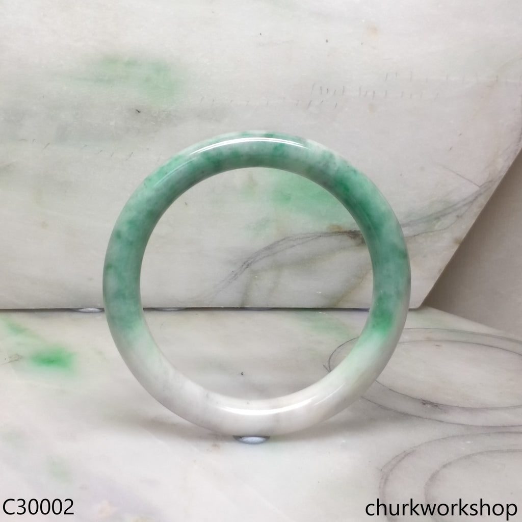 White base with splotches green jade bangle