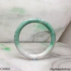 White base with splotches green jade bangle